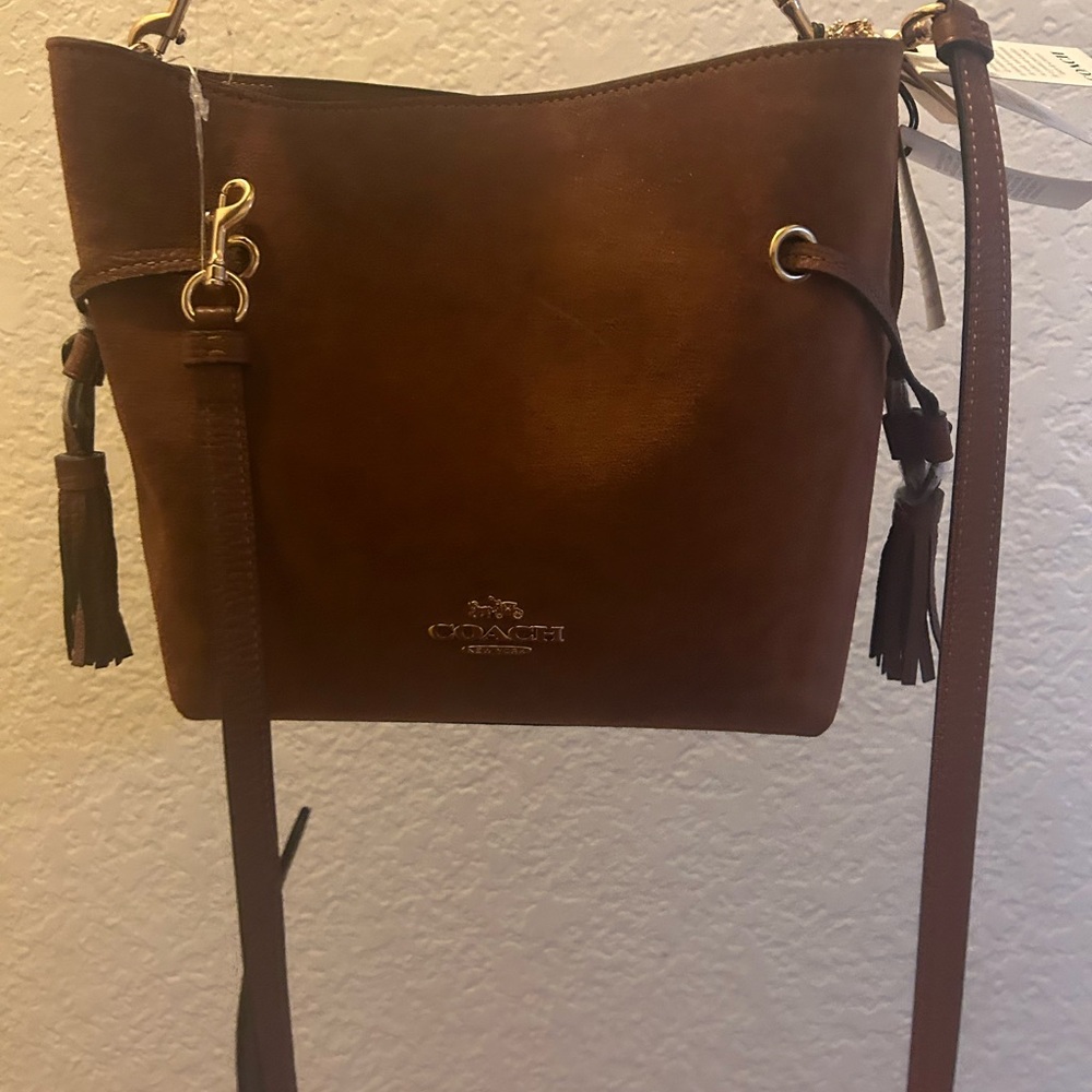 BROWN SUEDE COACH BAG. WITH SHORT AND LONG STRAP. NEVER USED WITH TAGS